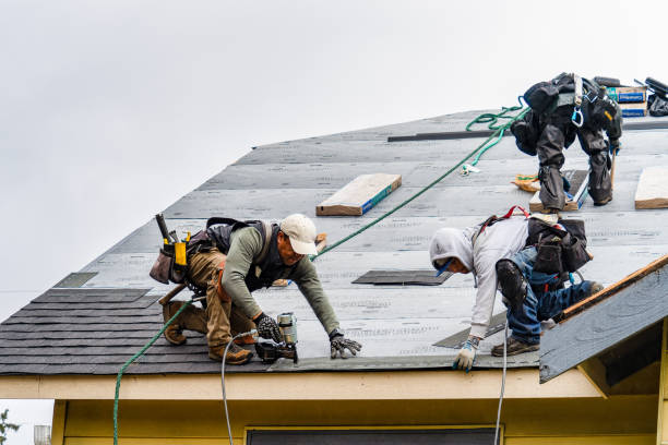 Professional Gutter Installation technician working in Attleboro, MA